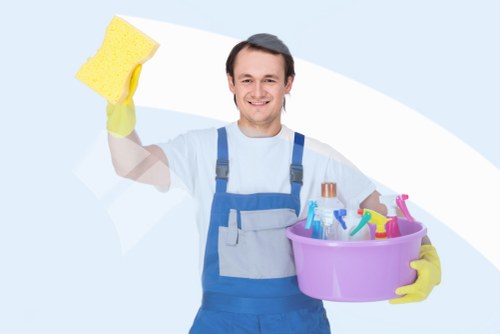 Window cleaner handling upper-floor access in SW12